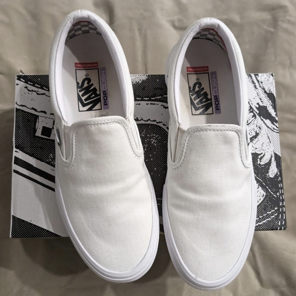 Vans White Canvas Slip-On Sneakers